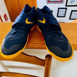 Navy Blue and Gold size 5.5 Basketball sneakers.